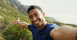 © Jordi D/peopleimages.com - Selfie, hiking and happy man in nature for holiday, POV and travel influencer show mountain. Asian person, portrait and profile picture for trekking, adventure and photo for social media in Cambodia