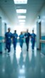 © Fahmi - 'Blurred Medical Team Walking in Hallway