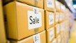 © StasySin - A stack of boxes with the word Sale written on them. The boxes are piled on top of each other, creating a sense of abundance and value