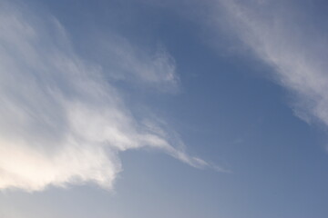 Wall Mural - beautiful blue sky and white cloud background in springtime