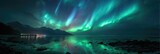 Northern lights above the arctic sea panoramic wide shot. Beautiful polar Aurora Borealis colourful lights in the night sky