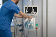 © Carmen - Doctor preparing ventilator machine in hospital room