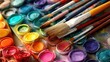 © Cuballe - Colorful paint palettes and brushes for art