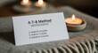 © Anna - 4-7-8 breathing exercise card with lit candle on cozy blanket