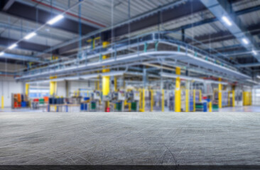 blur background of a industrial setting featuring a spacious manufacturing facility with organized w