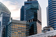 © Rendara Studio - Urban skyline at golden hour with illuminated workspaces, Singapore, Asia