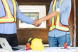 © NVB Stocker - Closeup Handshake Unity and teamwork : Male Engineering Architect and contractor People shaking hands on business cooperation agreement. Successful hand shaking after good deal. japanese and black man