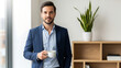 © True Stock - Confident Businessman Enjoying Coffee Break in Modern Office