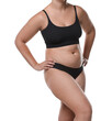 © New Africa - Liposuction. Woman in underwear on white background, closeup