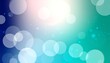 © Hridus - Soft focus bokeh lights with a vibrant blue to green gradient background and bright white light flare