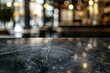 © kasur - Empty Black Marble Stone Table Top and Blurred Bokeh Cafe and Restaurant Background