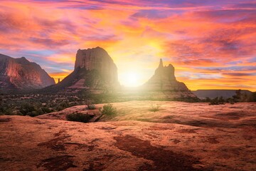Wall Mural - scenic view of a sunset over sedona's red rock formations with vibrant sky colors.