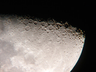 Wall Mural - half moon photograph through a telescope.