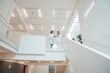 © BusinessClass by W61 - Medical team of doctors meeting in modern hospital interior