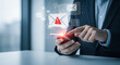 © SamiaAkter - Businessman receiving an urgent email alert on his smartphone, highlighting potential risks and security threats in digital communication