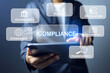 © AREE - Compliance concept with businessman touch on virtual interface represent to implement the standard and regulation to meet a global trading requirement