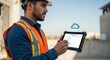 © DigitalSpace - Worker marking off punchlist items on a cloudconnected tablet documenting construction defects during an exterior walkthrough.