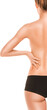 © master1305 - Back view of woman in black shorts touching lower back isolated on transparent. Concept of posture care, spine health, chronic pain prevention, and body wellness awareness.