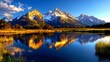 © Chananthorn - Grand Tetons and reflection. Majestic peak mirrored tranquil water scenic vista natural beauty outdoor adventure mountain range pristine lake travel destination explore wyoming