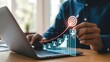 © MDSHAFIQ - Person with a Business Target on Laptop, business strategy and goal achievement, financial growth.