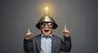 © ENDRA - Young boy wearing a helmet and glasses with a lightbulb on top, symbolizing a brilliant idea and innovation