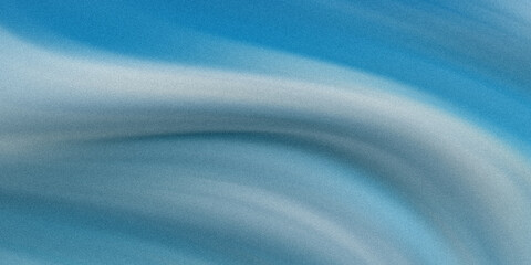 Wall Mural - a softly textured blue gradient creates a serene and abstract background with gentle waves of light 