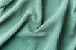 © reddish - Wrinkled mint  eco fabric texture background close up cotton textile