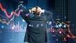 © Who is Danny - Businessman holding head in stress while looking at falling red financial charts on digital screen with downward market trend and graph collapse.