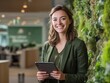 © Havoc - Woman tablet business office green plant smile professional technology