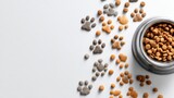 Pet food scattered alongside paw prints on a clean surface creates a playful atmosphere for animal lovers and pet owners