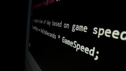 Closeup macro shot movement of coding script moving across LED screen with real-time AI-generated typing, showcasing advanced AI learning in optimization, debug and coding for software development.