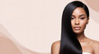 © JuliGross - Young African American woman with shiny long black hair. Hair care, beauty and cosmetics banner. Studio shot with copy space.