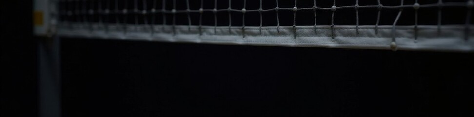 White volleyball net, taut, against pure black , threads, string