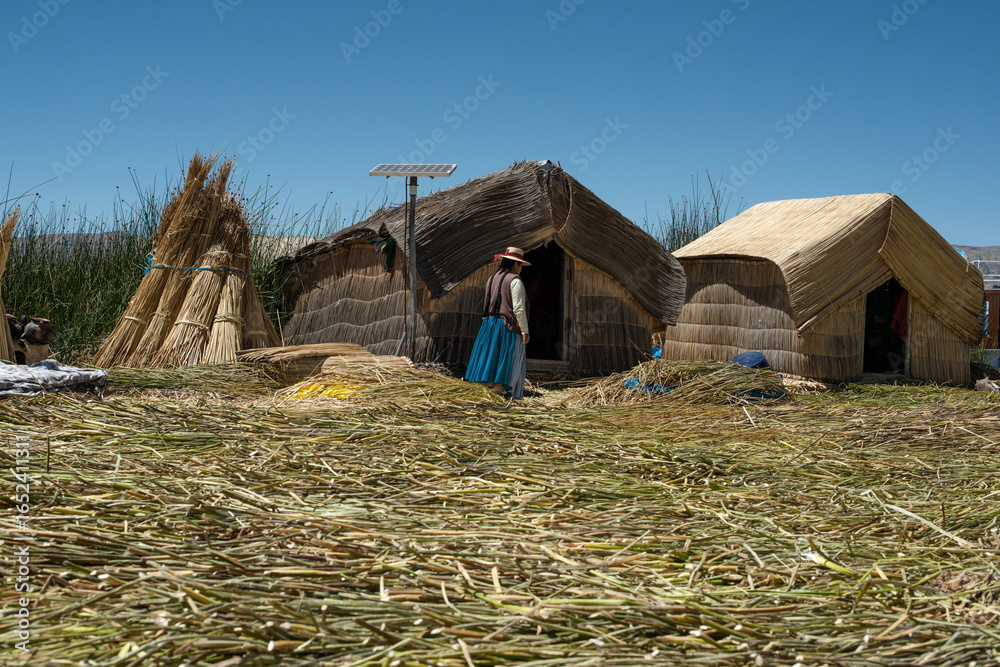 Reed houses on the floating Uros islands of Lake Titicaca, Peru, built ...