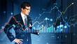 © Who is Danny - Businessman analyzing digital financial chart with currency and market data on a futuristic screen in double exposure office background.