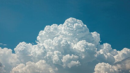 Wall Mural - close perspective of thick cumulus clouds signaling an impending storm