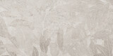 stone texture with subtle leaf pattern creating natural botanical abstract background.