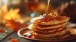 © PrettyVectors - Golden maple syrup drizzling over stack of pancakes