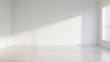 © Subrota - A bright and empty room with sunlight streaming in through the window with white walls and floor