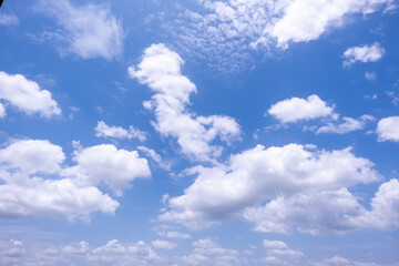Wall Mural - clear blue sky background,clouds with background, blue sky background with tiny clouds. white fluffy