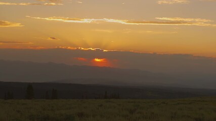 Sticker - Golden Hour Sky Above Mountain Scenery. Timelapse