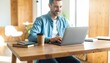© StocksJust4You - Happy hispanic man sitting at desk, working on laptop in bright modern home interior, cozy atmosphere, natural light, professional lifestyle