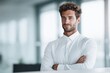 © Chayada - Professional man in white shirt corporate office portrait photography modern environment confident viewpoint business concept