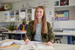 © Rido - Portrait of happy smiling student at high school class
