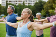© Rido - Senior people practicing yoga and mindfulness