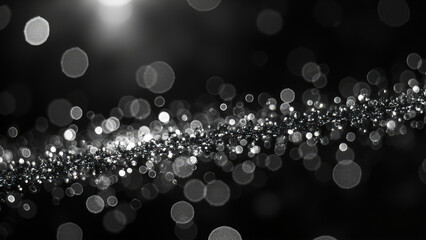 Abstract black and white with bokeh effect featuring a sparkling silver line of light and floating blurred circles