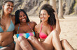 © DisobeyArt - Multiracial young women having fun on the beach during summer vacation - Travel and holidays concept - Main focus on right girl wearing red bikini