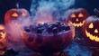 © David - Halloween punch bowl with blueberry eyeballs and jackolanterns surrounded by smoke for a spooky party