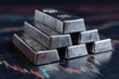 © Alexander - silver bullion bars stacked on stock market chart with financial data and graphs representing investment and wealth concept