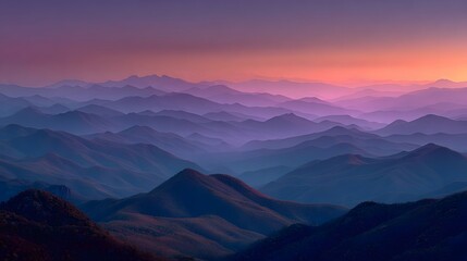 Wall Mural - Breathtaking landscape of layered mountain ranges at dusk. Receding hills are bathed in a serene haze of orange, pink, and purple gradients.